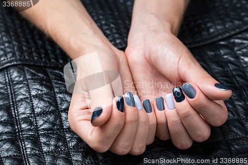 Image of Women\'s hands with a stylish manicure.