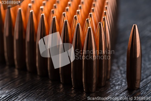 Image of Macro shot of copper bullets 