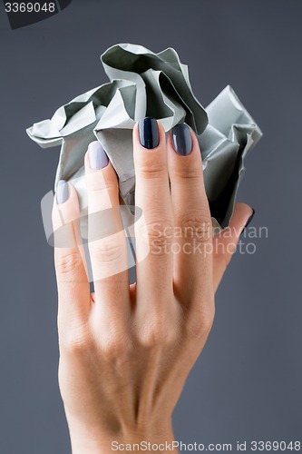 Image of Stylish manicure in shades of gray female elegant handles.