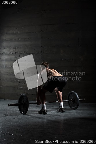 Image of Portrait of a handsome athlete from behind