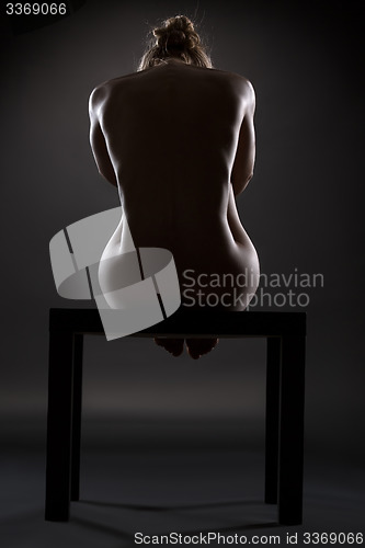 Image of Art nude picture of naked blonde in the studio