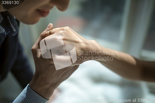 Image of Hands newlyweds