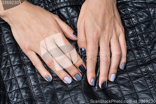 Image of Women\'s hands with a stylish manicure.