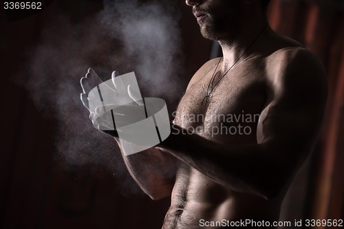 Image of hands with chalk