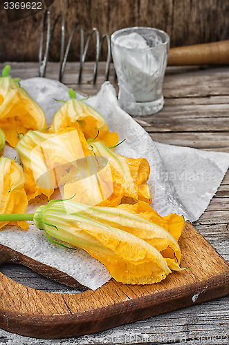 Image of Yellow pumpkin flowers,as an element of meals