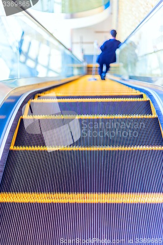 Image of Escalator or moving staircase in modern architecture