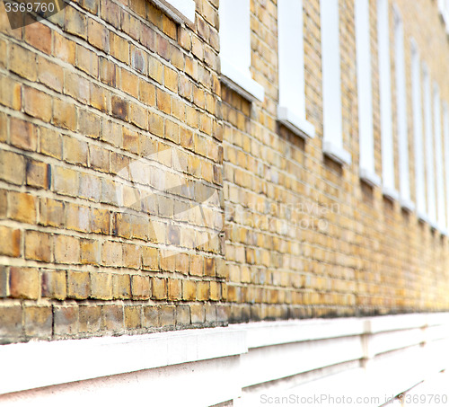 Image of old window in europe london  red brick wall and      historical 