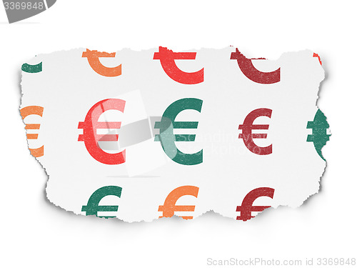 Image of Currency concept: Euro icons on Torn Paper background