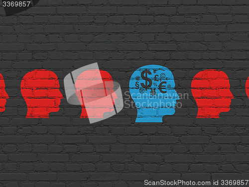 Image of Business concept: head with finance symbol icon on wall background