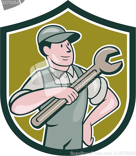 Image of Mechanic Pointing Spanner Wrench Shield Cartoon