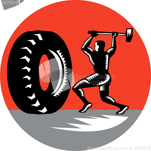 Image of Tire Sledgehammer Workout Woodcut