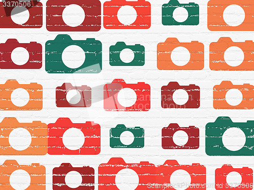 Image of Vacation concept: Photo Camera icons on wall background