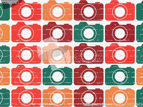 Image of Vacation concept: Photo Camera icons on wall background