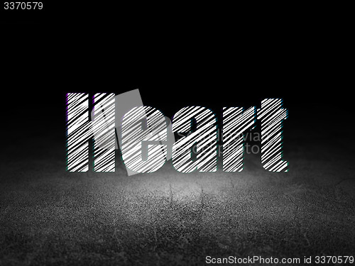 Image of Healthcare concept: Heart in grunge dark room
