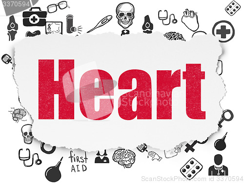 Image of Medicine concept: Heart on Torn Paper background