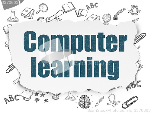 Image of Education concept: Computer Learning on Torn Paper background