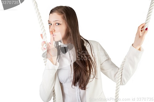 Image of Young beautiful woman gesturing to silence 