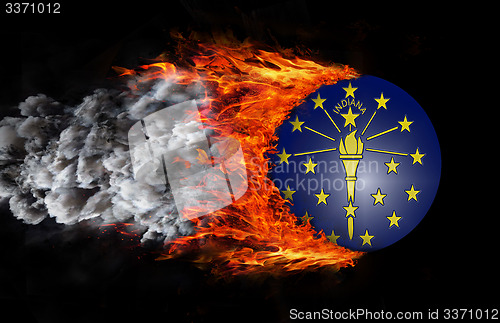 Image of Flag with a trail of fire and smoke - Indiana