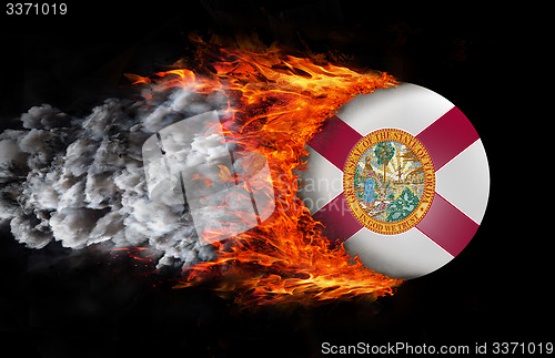 Image of Flag with a trail of fire and smoke - Florida