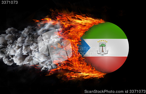 Image of Flag with a trail of fire and smoke - Equatorial Guinea