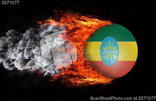 Image of Flag with a trail of fire and smoke - Ethiopia