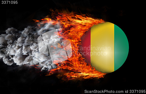 Image of Flag with a trail of fire and smoke - Guinea