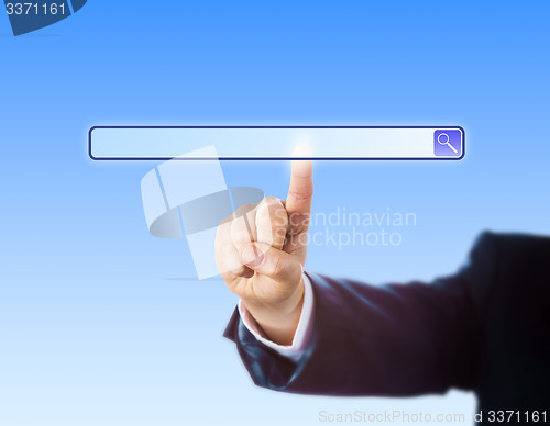 Image of Arm In Suit Touching A Blank Search Engine Tool