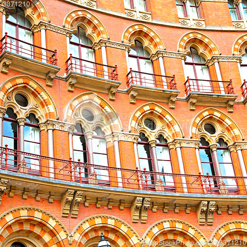 Image of old architecture in london england windows and brick exterior   