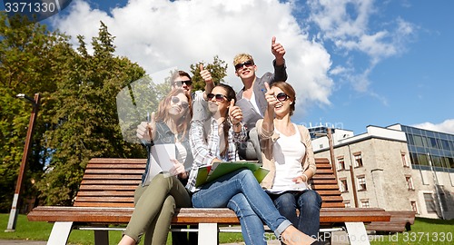 Image of group of students or teenagers showing thumbs up