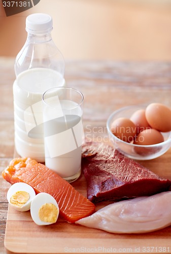 Image of close up of natural protein food on wooden table