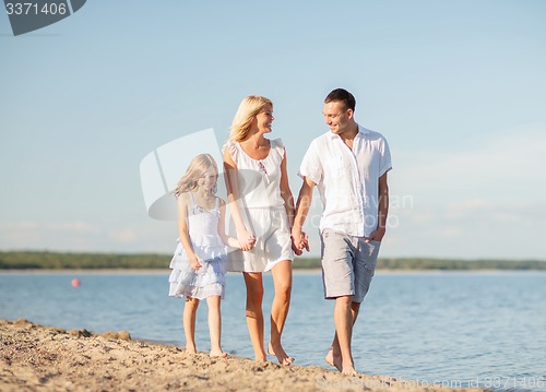 Image of happy family at the seaside