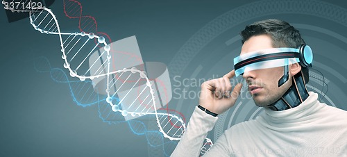 Image of man with futuristic 3d glasses and sensors