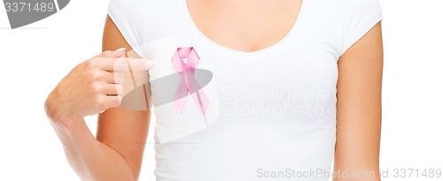 Image of woman in blank t-shirt with pink cancer ribbon