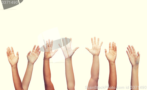 Image of human hands waving hands