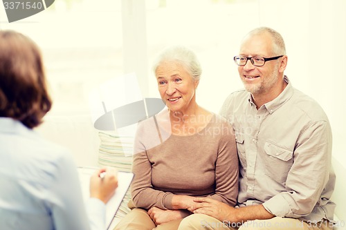 Image of happy senior couple at home