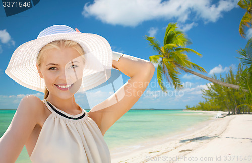 Image of beautiful woman enjoying summer outdoors