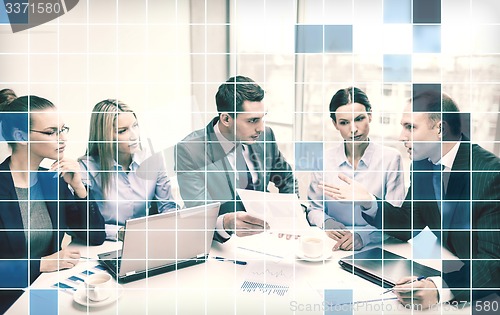 Image of business team with laptop having discussion