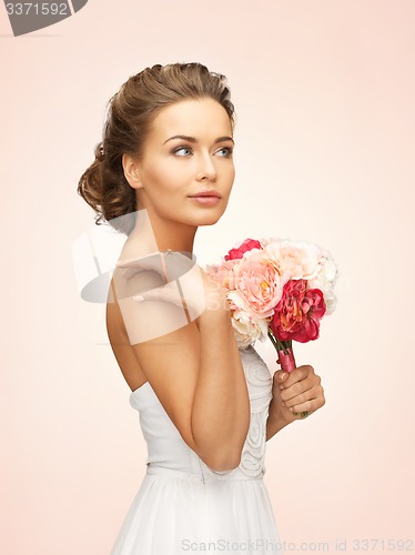 Image of woman with bouquet of flowers