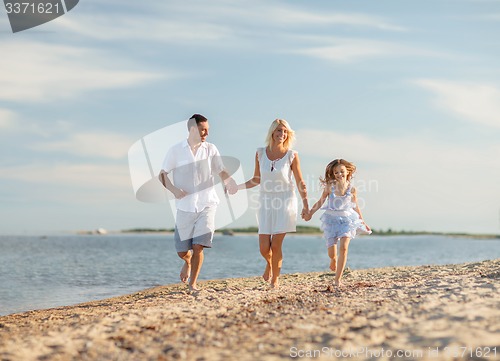 Image of happy family at the seaside