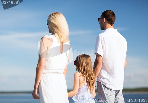 Image of happy family at the seaside