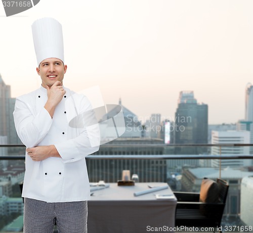 Image of happy male chef cook thinking