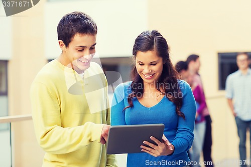 Image of group of smiling students tablet pc computer