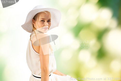 Image of beautiful woman enjoying summer outdoors