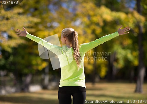 Image of woman doing sports outdoors