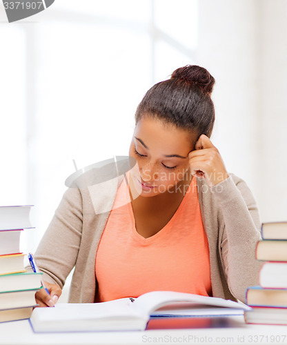 Image of international student studying in college
