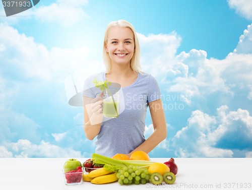 Image of smiling woman drinking juice or shake over sky