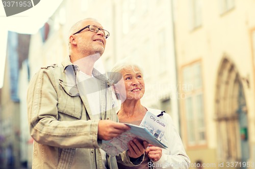 Image of senior couple on city street