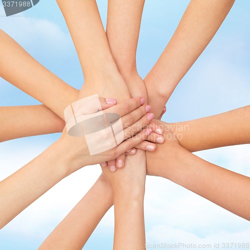 Image of close up of hands on top