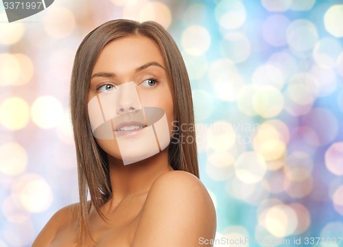 Image of face of beautiful young happy woman with long hair
