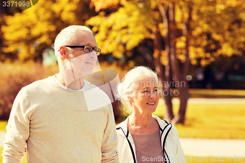 Image of senior couple in city park